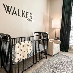 a baby's crib in the corner of a room