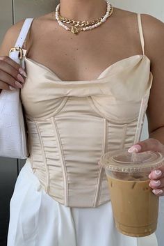 champagne white cream neutral corset top tank bustier dress pants white purse coffee nail nail art necklace gold pearl chain layer fashion style outfit girl trend inspo 2022 fall Silk Button Up Outfit, Gold Corset Top, Swirl Nail, Gold Corset, Satin Corset Top, Silk Button Up, Satin Corset, Pink Swirls, Bow Detail Dress