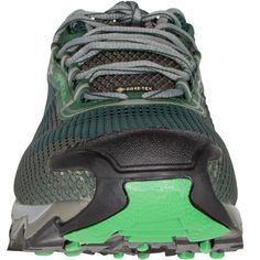 the shoe is green and grey with black accents on it's outstep