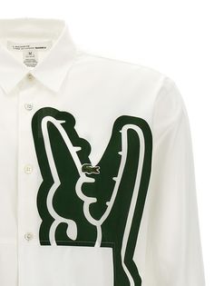 Comme Des Gar s shirt x Lacoste in cotton poplin with contrasting logo print, logo patch and button closure. Composition: 100% cotton French Clothing Brands, René Lacoste, Crocodile Logo, Lacoste Shirt, Burberry Shop, French Outfit, Comme Des Garcons Shirt, Engineered Garments, Print Logo