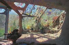 the interior of an abandoned building has been painted with many colors and designs on it