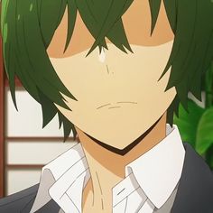 an anime character with green hair and white shirt