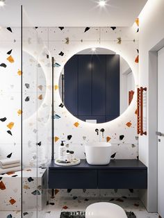 the bathroom is decorated in white and blue with birds on the wall behind the mirror