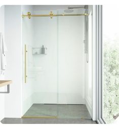 a bathroom with a walk in shower next to a window