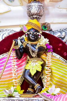 a statue of a hindu god is displayed