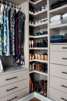 the closet is full of shoes, pants and other things to put in it's drawers