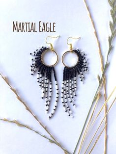 "Handmade, lightweight, durable, beaded dangle earrings. For bird, raptor, and falconer enthusiasts! Bird type: Martial Eagle. Native to Africa! Size: Medium hoop size, and 4 inches total length from hook to end of the longest beaded strand. Hoop size: Medium: 20mm (0.8 inches) Materials: Silver hooks, with White K hoops. Made with glass beads, 6lb mirco-infused Fireline thread, glue, and rubber earring backing. Care instructions included. Processing: Please allow 1-3 days for processing. Shipping: Sent USPS Ground. Delivery time depends on your location. Returns: You may return your item as long as you pay for return shipping. A full refund will be given if the jewelry is returned in the same condition when purchased.  40% of every raptor related sale is donated to the Rocky Mountain Rapt Martial Eagle, Seed Bead Jewelry Patterns, Bird Types, Bead Tutorials, Glass Bead Earrings, Beaded Earrings Patterns, Beaded Dangle Earrings, Earring Patterns, Bead Jewelry