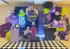 a birthday party with balloons and decorations