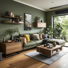 a living room filled with furniture and lots of plants on the wall above it's windows