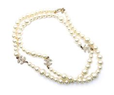 Chanel Necklaces - Up to 70% off at Tradesy Chanel Black And White, Long Pearl Necklaces, Dangle Necklaces, Black White Gold