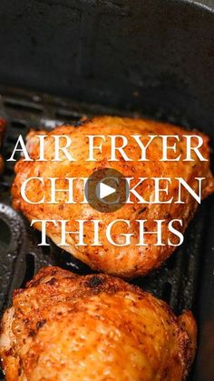 chicken thighs cooking on the grill with text overlay that reads air fryer chicken thighs