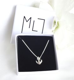 An anchor necklace typically  symbolizing stability, hope, and strength.  Details: *  925 solid sterling silver - all components, *  anchor size:  10 mm width, 13 mm height, *  chains: 16", 18" or 20". *  gift box will be provided. For more designs please click the link below.   https://meloujewellery.etsy.com Anchor Jewelry, Anchor Pendant, Anchor Charm, Anchor Necklace, Gift For Him, Pendant Necklaces, Charm Necklace, Gifts For Him, Jewelry Necklace Pendant