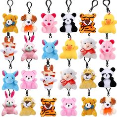 a bunch of small stuffed animals hanging on a hook with some sort of cord attached to them