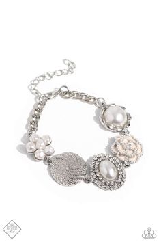 A refined display of shimmery pearl charms and floral-inspired accents gather along the wrist creating a cultivated display. The hodgepodge of texture and sheen includes pearl-adorned flowers in various shapes, borders of white rhinestones around an oval pearl center, and tactile silver studs emanating in a twisted pattern. Features an adjustable clasp closure. Sold as one individual bracelet. January Fashion, Dainty Band, Coil Bracelet, Jewelry Catalog, White Bracelets, 5th Avenue, Paparazzi Accessories, White Necklace, Stretchy Bracelets