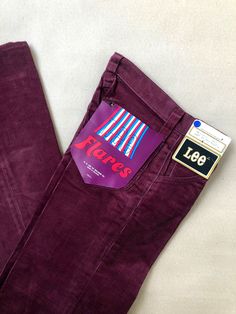 Amazing pair of vintage corduroy pants in deep rich burgundy with a low rise, slim fit and flared legs. Locally sourced from a closed down jeans store, they still have the original Lee manufacturing tag from the 1960s! The corduroy fabric is made from 100% cotton in Belgium and the pants close with a talon 42 zipper and Lee button. We recommend that you buy your fit by following these measurements, Waist: 70cm / 27.5'' Front rise: 23cm / 9.0'' Seat: 80cm / 31.5'' Inseam: 79cm / 31.0'' Label size Vintage Straight Leg Corduroy Jeans, Flared Corduroy Pants, 70s Corduroy, Jeans Store, Deep Burgundy, Vintage Pants, Corduroy Pants, Label Sizes, Jeans Shop