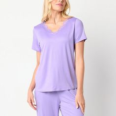 End the day on a chic note with this stylish Ambrielle women's short-sleeve pajama top. Crafted from a super-soft jersey, this pullover top style has a lace-trimmed v-neckline and cap sleeves. Slip it on with your favorite pair of pajama bottoms and a robe. Features: Lace TrimClosure Type: Pullover HeadNeckline: V NeckSleeve Length: Short SleeveSleeve Style: Cap SleeveApparel Length: 25 InchesFiber Content: 95% Polyester, 5% SpandexFabric Description: JerseyCare: Machine Wash, Tumble DryCountry Purple Short Sleeve Loungewear Sets, Spring Short Sleeve Sleepwear For Relaxation, Feminine Short Sleeve Sleepwear With Relaxed Fit, Feminine Relaxed Fit Short Sleeve Sleepwear, Feminine V-neck Top For Bedtime, Purple Short Sleeve Sleepwear For Pajama Party, Purple Sleep Tops For Spring, Feminine Short Sleeve Loungewear Sets, Feminine Short Sleeve Sleep Sets