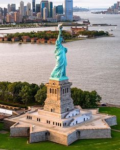 an aerial view of the statue of liberty in new york city