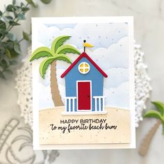 a handmade card with a house and palm tree on the beach that says happy birthday to my favorite beach bum