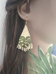 🌷☀️These hand beaded Monstera Leaf Earrings were made with colorful seed beads, all added individually. Each earring was stiffened to prevent folding.  Perfect for the summer or on vacation! ☀️🌸 Note: These hang to 3.5 inches. If you have a short neck like myself, these arent for you.  LOCAL PICK UP NOTE: THIS IS AVAILABLE FOR LOCAL PICK UP!  JUST SEND US A MESSAGE BEFORE YOU BUY IF YOU ARE LOCAL! CUSTOM ORDERS Would you like a custom order? Something similar but in a different size or color? Contact me and we can figure it out together - I love creating custom items so please don't hesitate to ask. Please allow 2-3 weeks from the date you submit payment for your custom order to be created and shipped. We will keep in contact through email so you can see the progress of your custom item. Handmade Beaded Drop Earrings For Vacation, Handmade White Beaded Earrings For Vacation, Adjustable Beaded Earrings For Vacation, Adjustable Handwoven Green Beaded Earrings, Handmade Beaded Earrings With Round Beads For Beach, Tiny Beads Drop Earrings For Beach, Handmade Beaded Earrings With Round Beads For Vacation, Handmade Round Beads Beaded Earrings For Beach, Tiny Beaded Drop Earrings For Beach