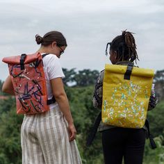 This backpack is our all-time favourite. If it's for work, travel or free-time activities, it is also an ideal bag for festival-goers due to its large size and rugged nature. Due to its material, MEMA is waterproof and durable. And with its spacious cotton lined main compartment, there is enough room for all your belongings. MEMA is your everyday companion. Made from recycled single-use plastic bags by our fair trade partners in Uganda, Every Reform bag is unique! Approx size: 40 x 11 x 48cm We Upcycling Plastic Bottles, Fused Plastic, Upcycle Plastic, Free Time Activities, Drainage Channel, Recycled Plastic Bags, 11 December, Recycle Bag, Top Backpacks