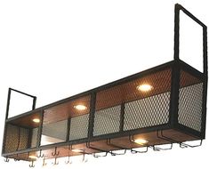 an overhead lighting fixture with four lights on it