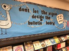 there is a sign on the wall that says don't let the pigeon design the bulletin board