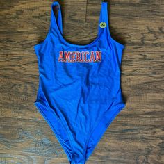 Brand New “American” Graphic One Piece Swimsuit. Never Worn. Size Medium. Perfect For 4th Of July!! Casual Forever 21 Swimwear For Beach, Forever 21 Casual Beach Swimwear, Casual Blue Bodysuit For Poolside, Casual Forever 21 Bodysuit For Summer, Forever 21 Summer Bodysuit For The Beach, 4th Of July Swimsuit, Forever 21 Sleeveless Beachwear Swimwear, Blue Casual Summer Bodysuit, Casual Blue Bodysuit For Summer