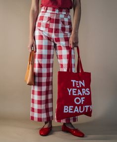 !!!Description---Celebrating ten years of MG, our limited edition red canvas tote commemorates a decade of beauty, love, NYC, and Italy. As seen at our NYFW presentation, shop four unique totes in limited quantities. All sales are final and not eligible for return. !!!Details---Width: 37.5 cm. / 14.75 in. Height: 39 cm. / 15.25 in.Handle Drop: 26.5 cm. / 10.25 in. !!!Materials---100% Cotton Sun Shadow, Red Canvas, Monogrammed Items, Color Swatches, Light Orange, Canvas Tote, Presentation, Limited Edition, Italy