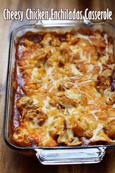 a cheesy chicken enchiladas casserole in a glass dish