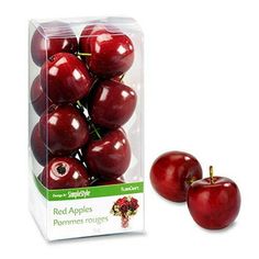 a package of red apples sitting next to each other