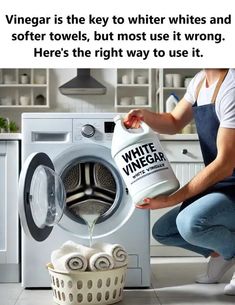 a woman is pouring vinegar into a washing machine with the words vinegar is the key to white whites and softer towels, but most use it wrong here's the right way to use it