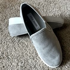 Steve Madden Slip On’s New Never Worn. Size 6.5 Runs Small So Would Fit Size 6 To 5.5 Better. Suede Material In A Light Grey Tone. Gray Slip-ons With Textured Sole For Spring, Gray Sneakers For Everyday Spring Use, Gray Everyday Sneakers For Spring, Gray Synthetic Slip-ons For Spring, Slipon Sneakers, Shoes Steve Madden, Grey Tones, Suede Material, Steve Madden Shoes