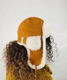 Our aviator hats are made of first quality sheepskin and fur. It is suitable for every style of dressing. Hats have a leather strap that snaps ear flaps under your chin. All of our products are handmade  Gloves that you can combine in similar styles are available on our page. Please contact us if you have any questions. Brown Sheepskin Hat With Faux Fur Lining, Sheepskin Hat With Faux Fur Lining And Ear Flaps, Shearling Hat With Faux Fur Lining And Ear Flaps, Sheepskin Hats With Ear Flaps For Outdoor, Sheepskin Outdoor Hat With Ear Flaps, Winter Sheepskin Hats With Plush Lining, Trapper Hat Men, Winter Hat Women, Aviator Cap