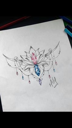 a drawing of a lotus with jewels on it