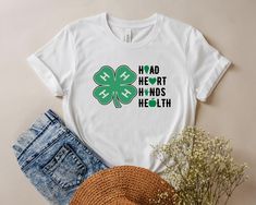 4H Life Tshirt, 4-H Life Shirt, Hands Head T-shirt, 4-H New Design Tshirt, 4H Shirt, St Patricks Day Shirts, Retro 4-H Life Tees, 4H Tshirts HI! Welcome to my shop, I'm pleased to see you here. My shop's main aim is to make you happy. I see you as a friend, not just a customer. Please contact me if you have any questions or want to get a custom-made design. I'm sure you'll love my designs. If you liked the design but didn't like the tshirt color we have, please contact me. I will do my best to m 4 H Shirts Designs Ideas, St Patricks Day Shirts, Retro 4, Design Tshirt, St Patrick Day Shirts, St Patricks, News Design, Tshirt Colors, New Design