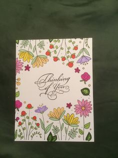 a greeting card with colorful flowers on it