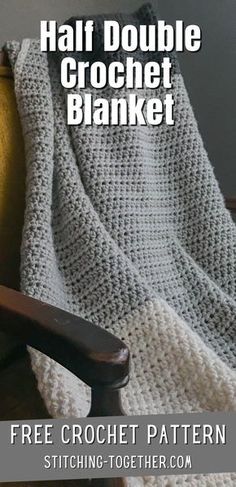 a crocheted blanket sitting on top of a wooden chair