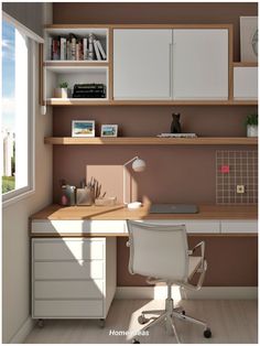 a desk with a chair and some books on top of it in front of a window