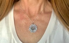 "This gorgeous silver mandala pendant is a visual stunner! Measuring 35 mm in length, this pendant is made of sterling silver and is strung on a beautiful sterling silver chain. The chain is quite beautiful thanks to tiny silver beads that dot along the chain and add extra sparkle as the light catches the flat edge. The model is wearing a 18\" length. This multi petaled flower is grounded in it's symmetry and beauty. It has a lovely weight and is an impressive piece in your collection." Sterling Silver Beads Jewelry For Meditation, Mandala Pendant, Ancient Coin Jewelry, Long Stone Necklace, Honeycomb Necklace, Hexagon Necklace, Mandala Necklace, Claw Necklace, Lotus Mandala