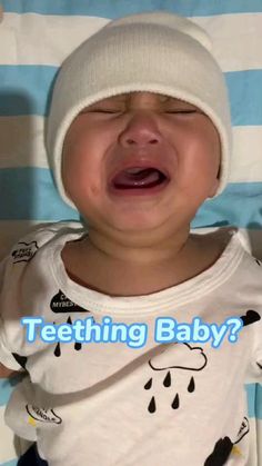 a baby crying with the caption'teething baby?'in front of him