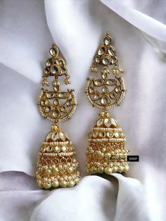 Pachi Kundan Brass White Jhumka Statement Designer Earrings. Length : 3.5 Inches Traditional Chandbali Jhumkas With Latkans, Chandbali Jhumkas With Latkans For Puja, Traditional Heavy Earrings For Puja, Heavy Chandbali Jhumkas For Puja, Bollywood Style Jhumkas With Latkans For Puja, Chandbali Earrings With Latkans For Puja, Chandbali Bridal Earrings With Latkans For Puja, Traditional Chandbali Earrings For Puja, Traditional Chandbali Tilla Jhumkas