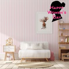 a room with pink striped walls and a white daybed