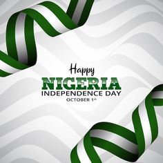 a green and white ribbon with the words happy nigra independence day