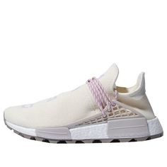 The Adidas Pharrell x N.E.R.D. x NMD Human Race Trail Cream is a unique and stylish sneaker that is perfect for anyone who loves to stand out from the crowd. With its mismatched design and bold colors, this sneaker is sure to turn heads no matter where you go. The comfortable and supportive construction makes it ideal for long days on your feet, while the Lugged rubber outsole provides superior traction on any surface. Whether you're hitting the streets or the trails, the Adidas Pharrell x N.E.R Beige Breathable Low-top Sneakers, Low-top Beige Breathable Sneakers, Beige Low-top Breathable Sneakers, Cream Athleisure Sneakers For Streetwear, Cream Slip-on Sneakers For Streetwear, Breathable Cream Sneakers For Streetwear, Cream Breathable Sneakers For Streetwear, Adidas Cream Sneakers With Laces, Cream High-top Running Shoes With Boost Midsole