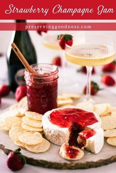 strawberry champagne jam with crackers on a platter