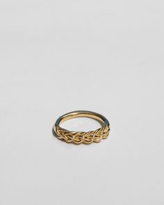 This soft and sumptuous gold ring was formed by braiding 6 strands of pliable sculpting wax to and then molding the braid in to a perfect, organic band that you'll never want to take off. Available in 10k or 14k gold, each piece is individually sculpted by hand in our studio and cast in 100% recycled gold. Band measures just under .25" at widest point. Availability: Made to order, ships in 3-4 weeks. Need it sooner? Email us prior to placing your order and we'll do our best to accommodate. Holiday Soiree, Strand Braid, Braided Ring, Recycled Gold, Small Jewelry, Polish Jewelry, Gold Band, 10k Gold, Jewelry Care