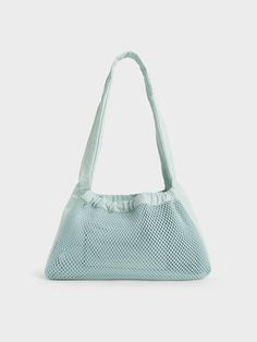 This product is made with at least 20% sustainable materials by weight. CHARLES & KEITH uses recycled, degradable, organic, and water-based materials in our eco-conscious collection.If you are looking for a bag to accompany you on days by the beach and poolside parties, this Terra shoulder bag is it. In lovely sage green, it will add a striking touch of colour to any summer outfit. Lightweight and functional, it will hold everything you want it to with ease. A bonus feature is the removable pouc Lightweight Nylon Shoulder Bag For Everyday Use, Summer Nylon Shoulder Bag For On-the-go, Summer Nylon Shoulder Bag For Everyday Use, Everyday Nylon Shoulder Bag For Summer, Versatile Recyclable Shoulder Bag For Daily Use, Eco-friendly Recyclable Shoulder Bag With Double Handle, Versatile Recyclable Shoulder Bag, Summer Nylon Bags For Everyday Use, Summer Nylon Bags With Removable Pouch