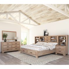 a bedroom with a bed, dresser and mirror