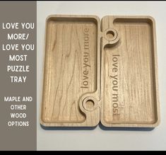 two wooden trays with the words love you more, love you most and puzzle tray on them