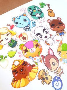 an assortment of cartoon stickers sitting on top of a table